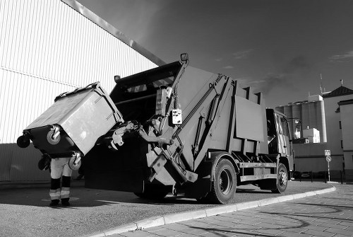 Man and van team loading recyclable office items
