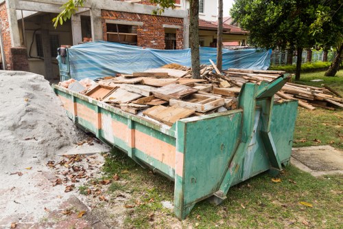 Professional loft clearance team assessing a Vauxhall home